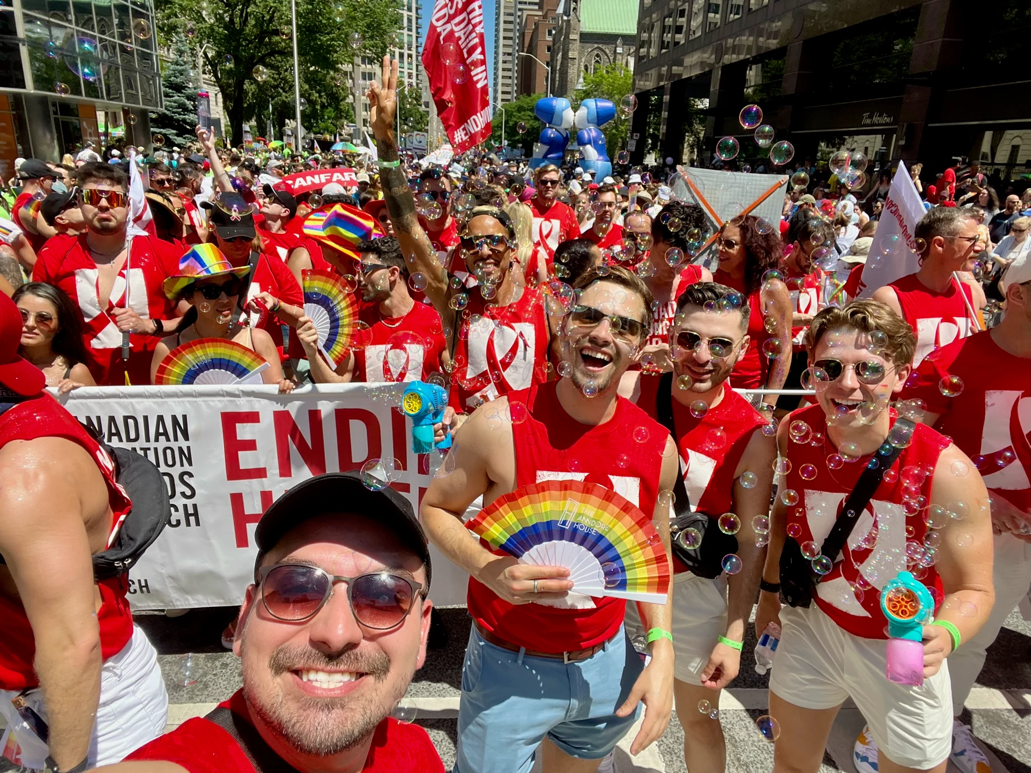 Dale McDermott marching with CANFAR, the Canadian Foundation for AIDS Research, at Toronto Pride