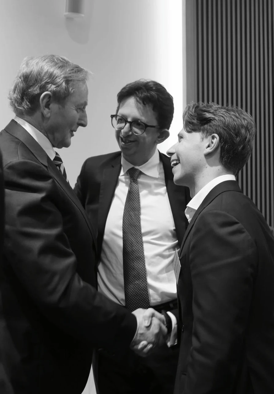 Dale McDermott with Enda Kenny, former Taoiseach of Ireland, at an event in London