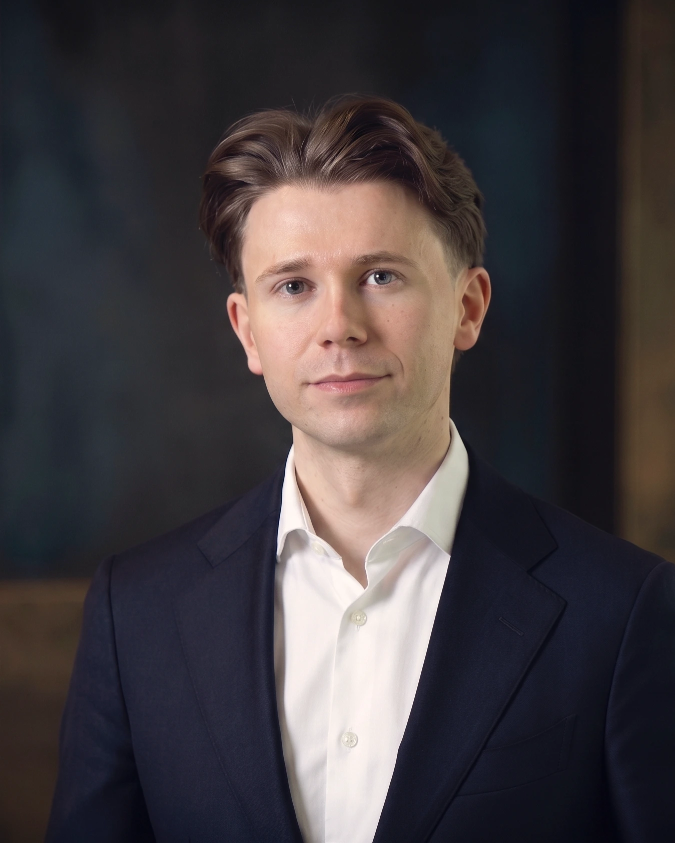 Dale McDermott, strategic advisor, in a dark blazer and open-collar shirt